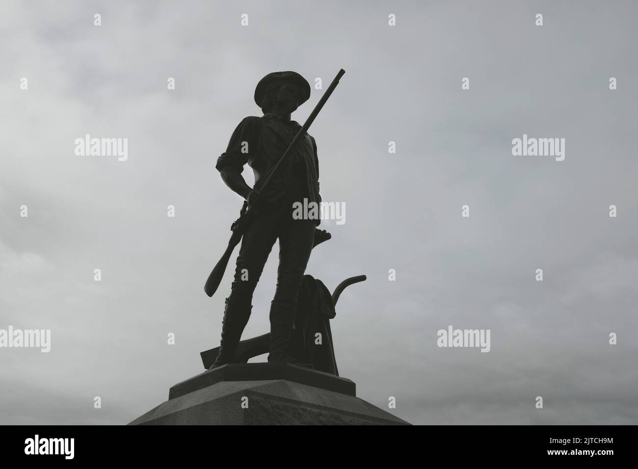 Silhouette of Minute Man Statue, Minute Man National Historical Park, Concord, Massachusetts, USA Stock Photo