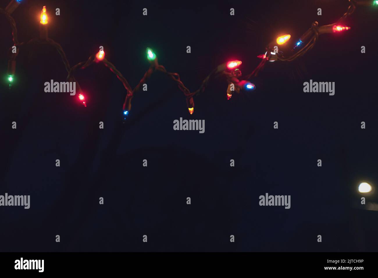 Christmas lights draped along Front Porch at Night Stock Photo Alamy