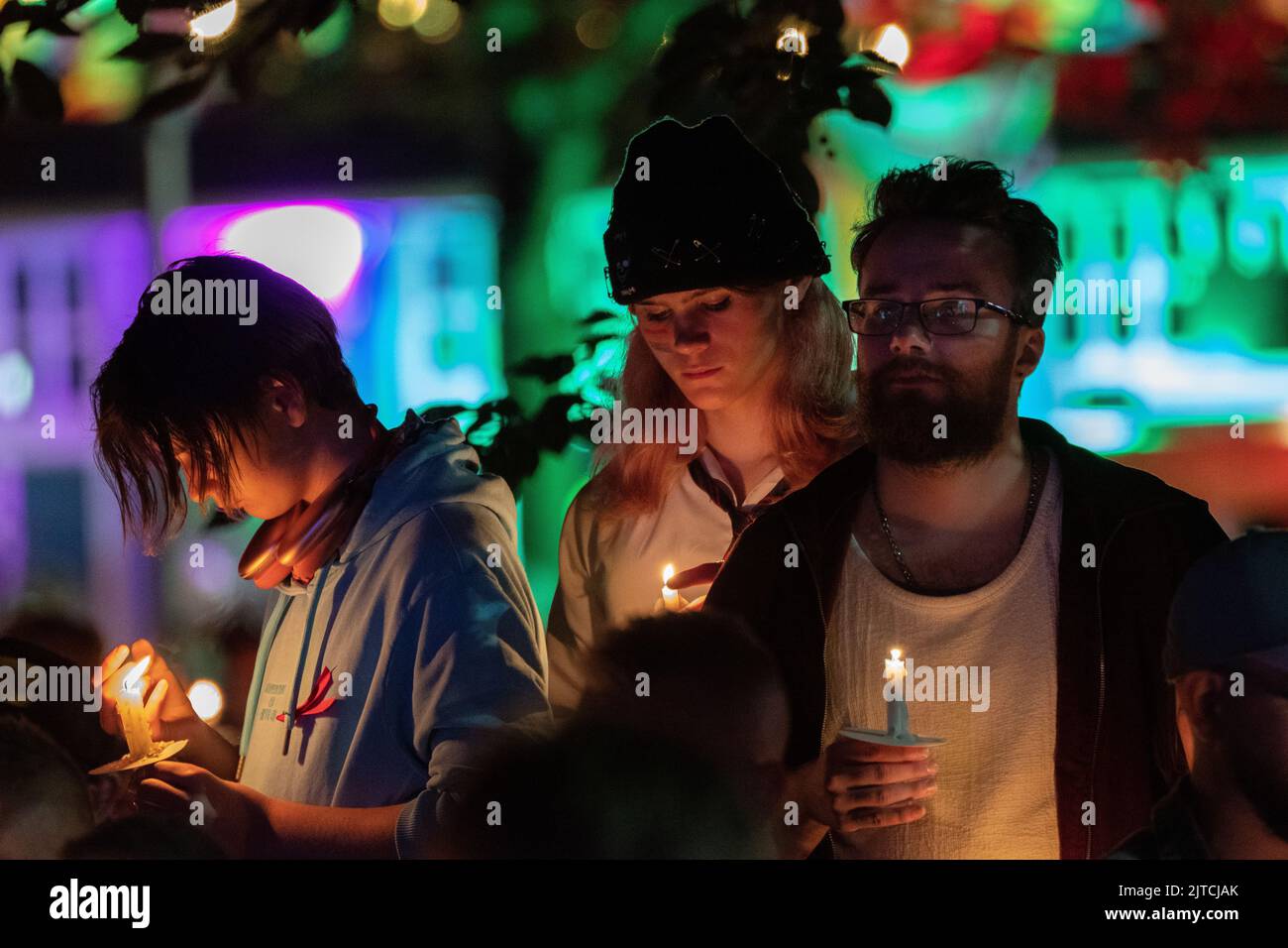 Manchester UK, 29/08/2022, Attendees light candles to remember the
