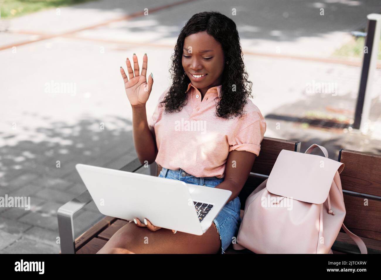 african student girl with laptop having video call Stock Photo - Alamy