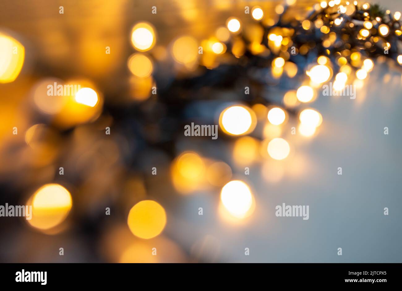 Blurred golden string lights hi-res stock photography and images - Alamy
