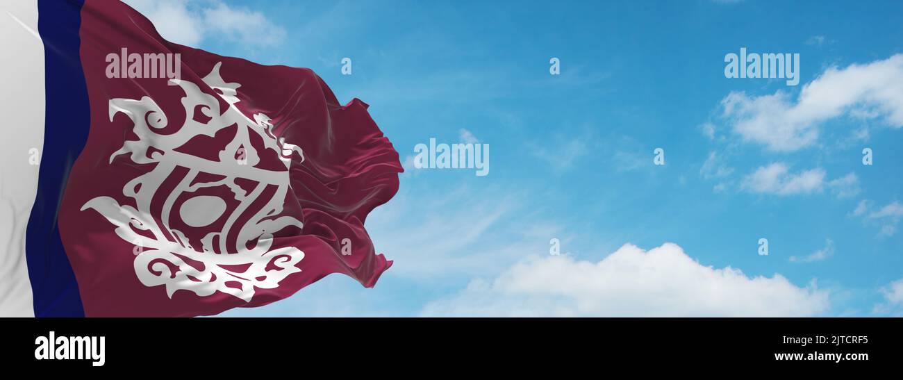 flag of Austronesian peoples Suluk at cloudy sky background, panoramic view.flag representing ethnic group or culture, regional authorities. copy spac Stock Photo