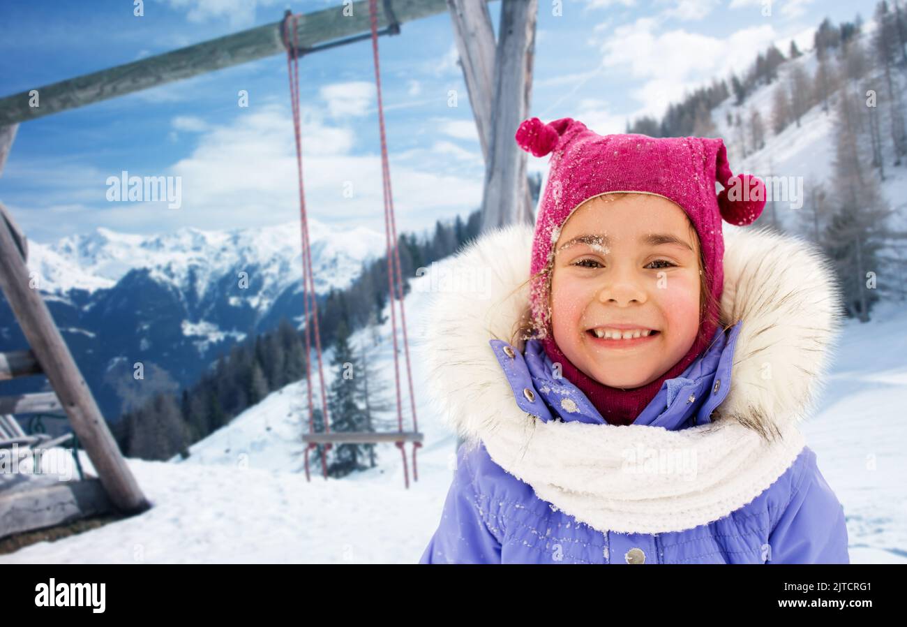 happy little girl in winter clothes outdoors Stock Photo - Alamy