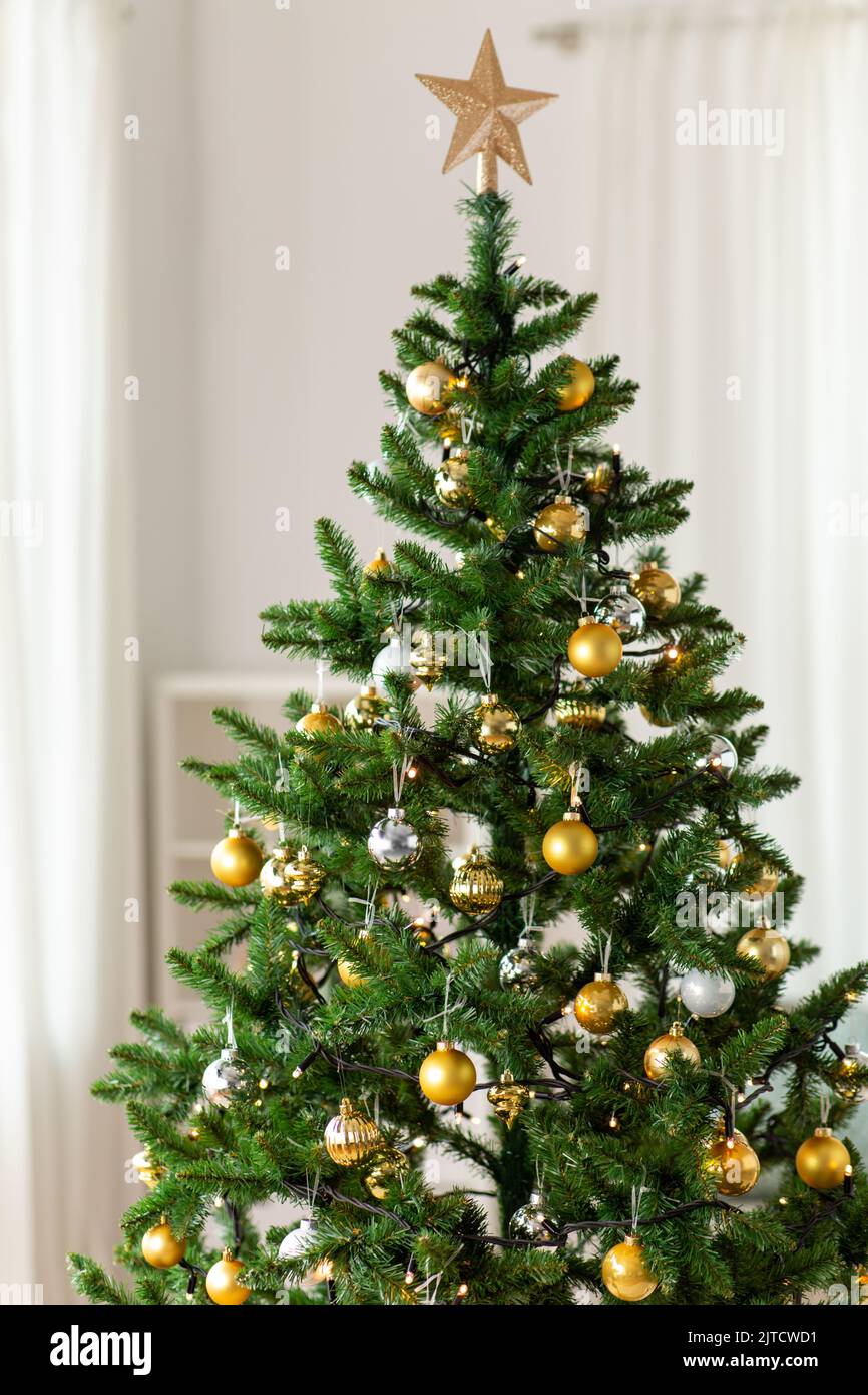 Silver decorated christmas fir tree hi-res stock photography and images ...