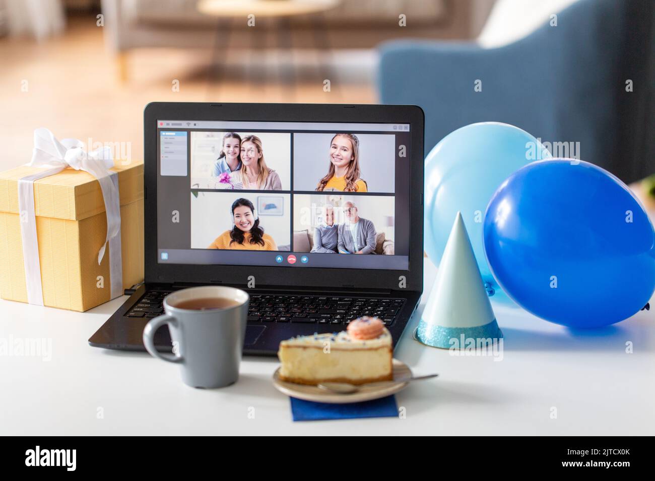 laptop with video call or online birthday party Stock Photo Alamy