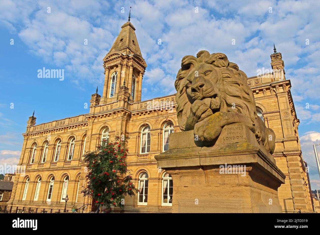 Stone Lion outside Victoria Hall Saltaire, world heritage village site, Shipley, Bradford, West Yorkshire, England, UK, BD18 3LA Stock Photo