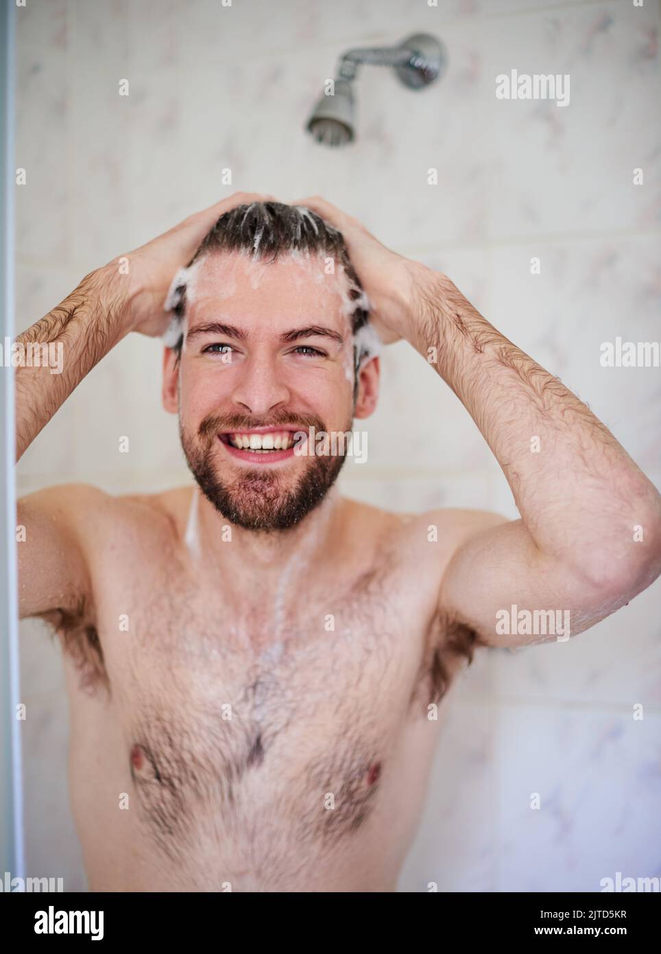 Showering male smiling hires stock photography and images Alamy