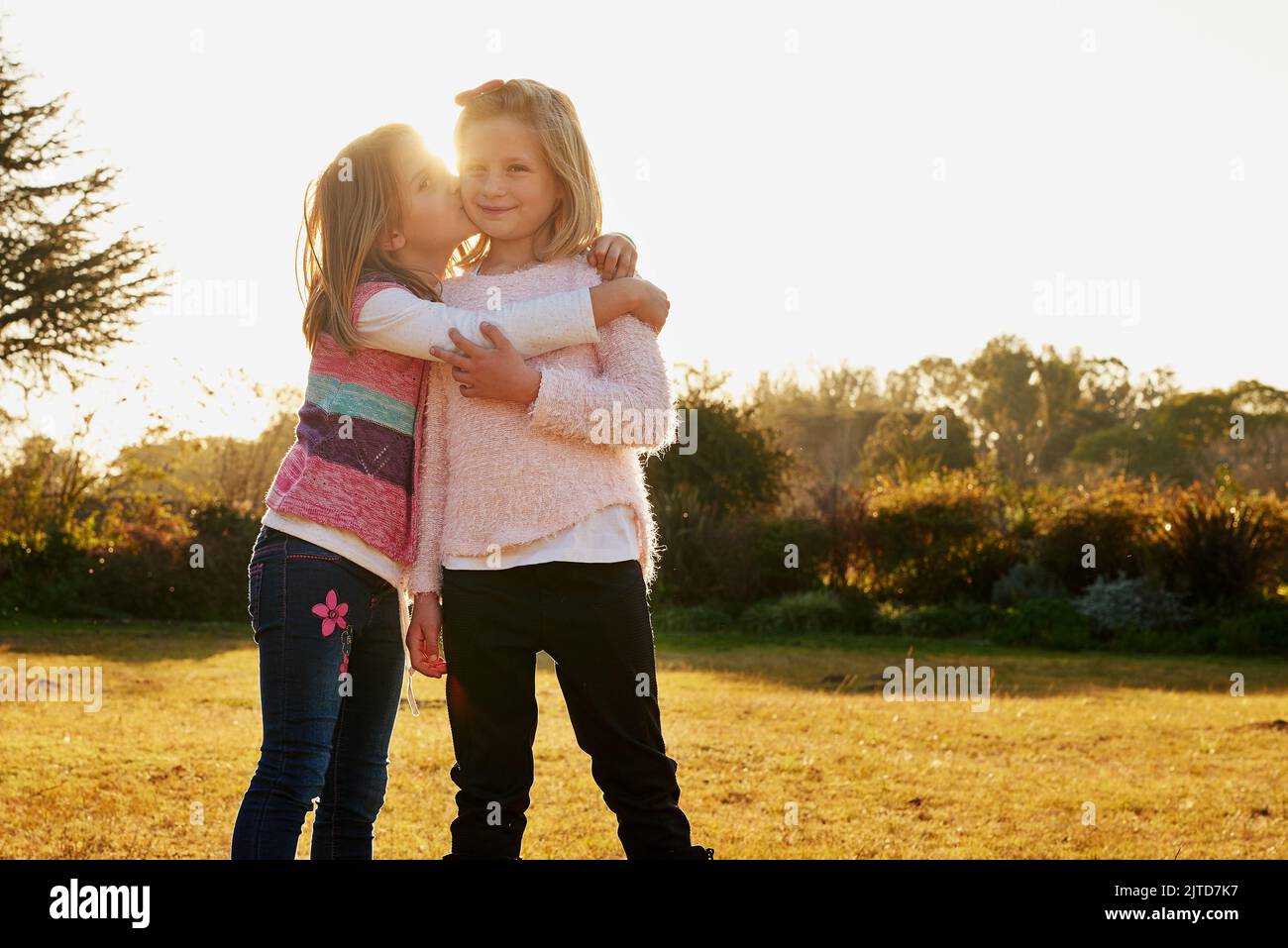 Its a friendship theyll continue long into their future. Portrait of two little girls having fun outside. Stock Photo