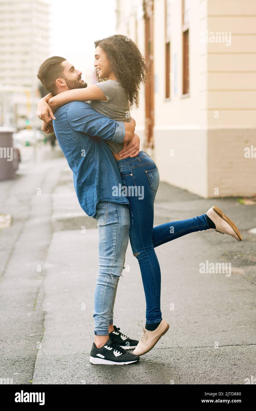 Im head over heels in love with you...a loving couple out in the city. Stock Photo