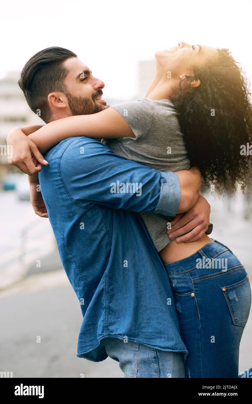 I want to be with you as often as possible. a loving couple out in the city. Stock Photo