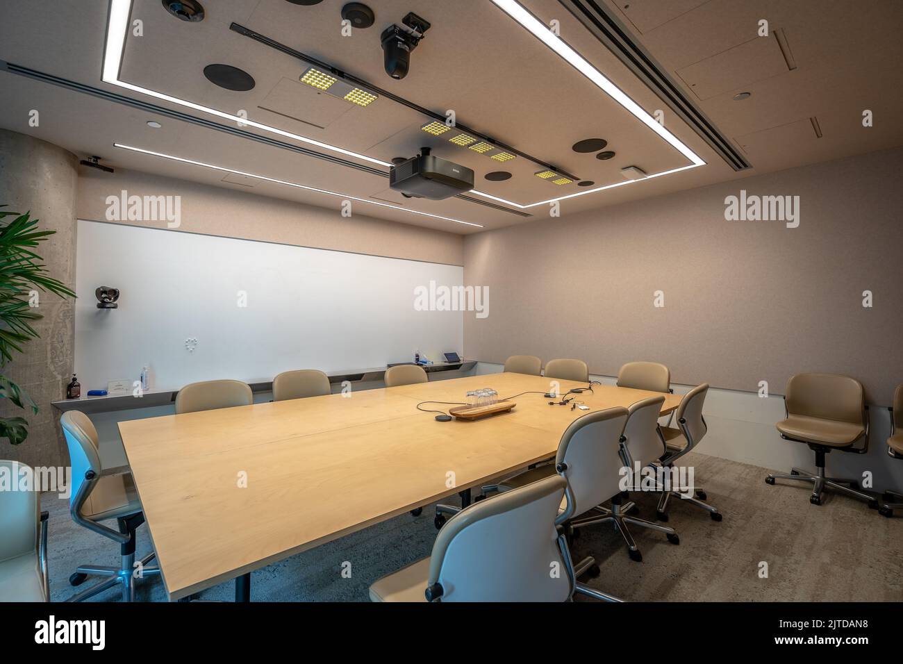 Contemporary office meeting room with a projection screen Stock Photo