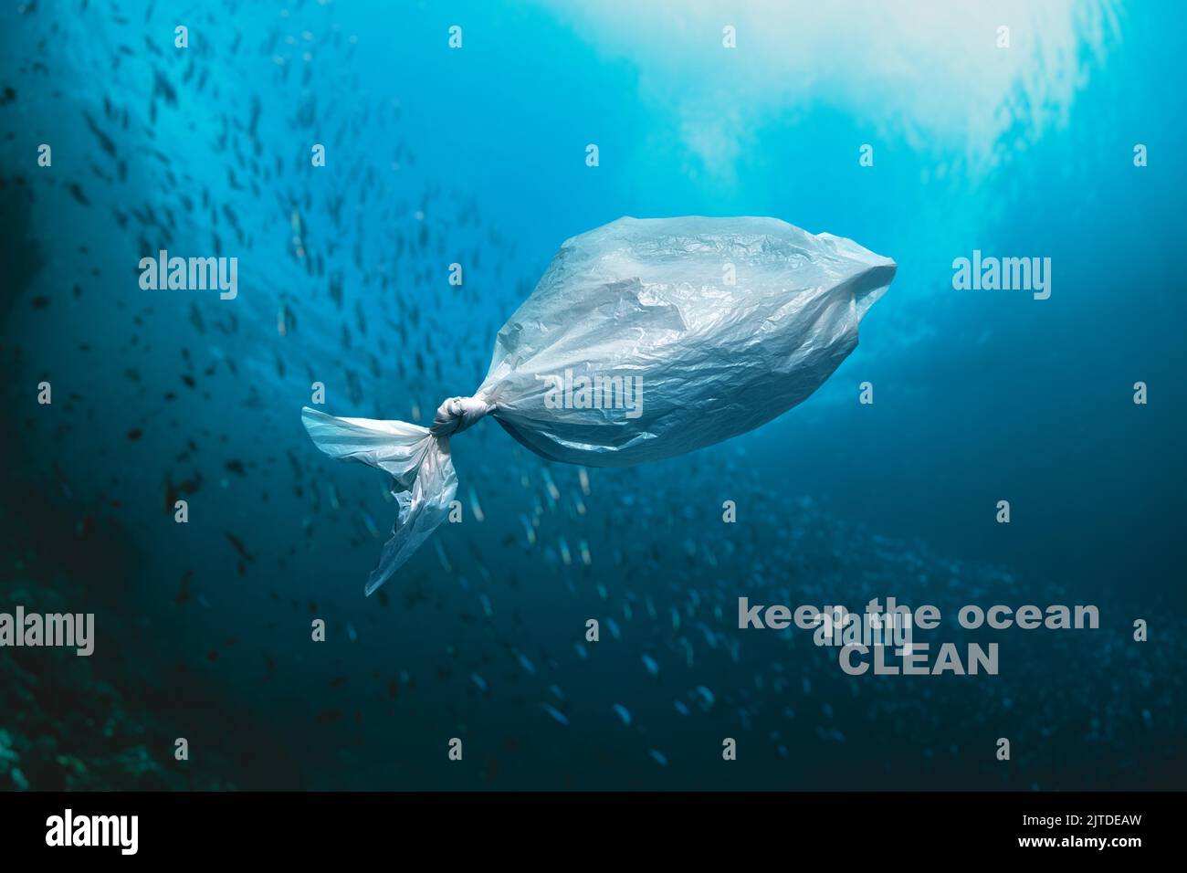 Plastic bag floating in the ocean - KEEP THE OCEAN CLEAN Stock Photo