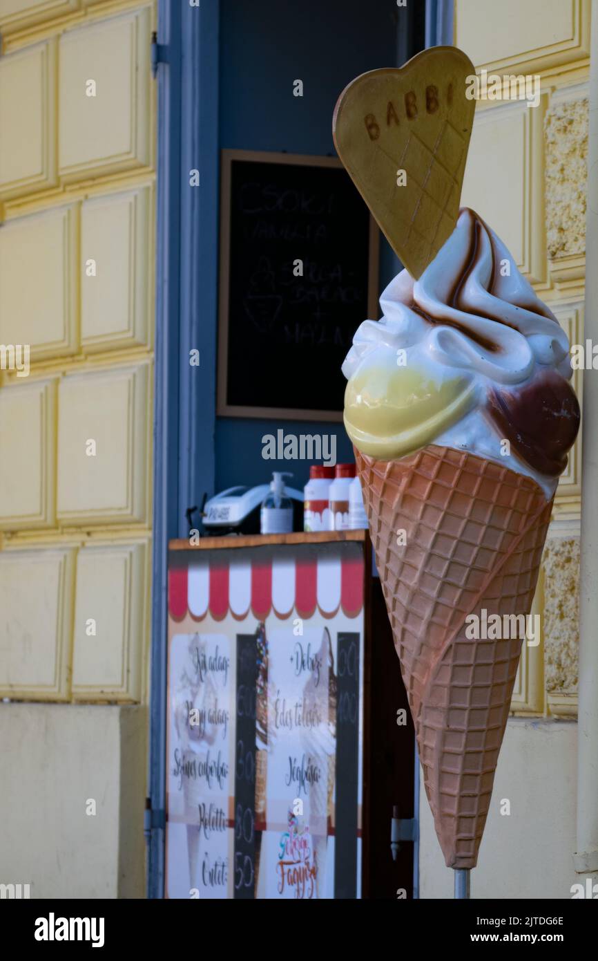 Giant plastic ice cream cone outside door Stock Photo Alamy