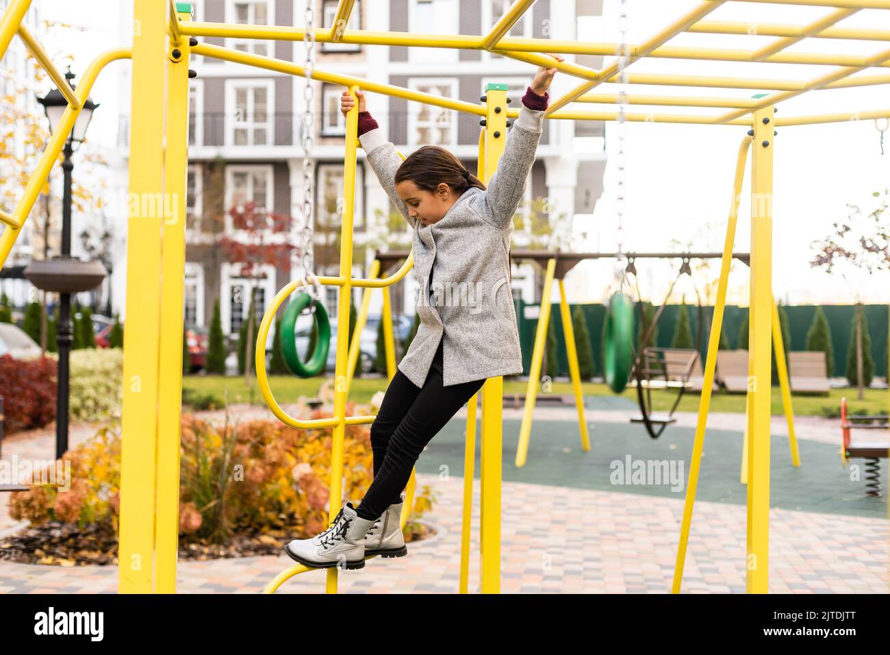 portrait of a little schoolgirl girl at the playground Stock Photo - Alamy