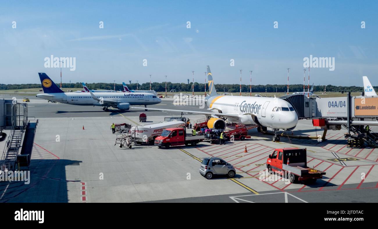 Hamburg, Germany. 23rd Aug, 2022. An Airbus A380-800 of the airline Emirates stands at a gate of Hamburg Airport. Hamburg Airport, proper name Hamburg Airport, since 2016 also Hamburg Airport Helmut Schmidt, is the international airport of the city of Hamburg. It is the oldest and fifth largest airport in Germany Credit: Markus Scholz/dpa/picture alliance/dpa | Markus Scholz/dpa/Alamy Live News Stock Photo
