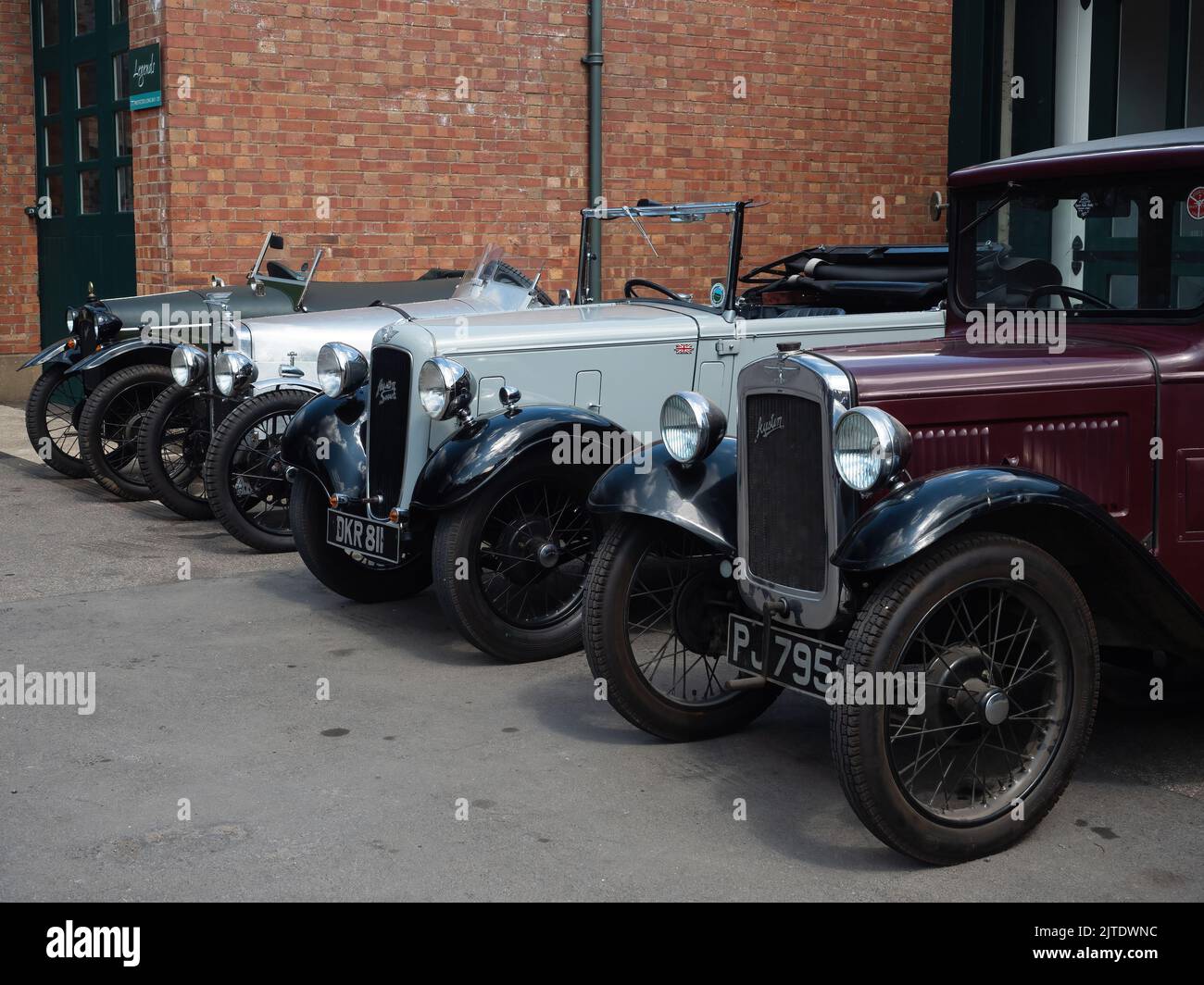 Line of Austin 7s at the Bicester Heritage Sunday Scramble - Bicester, Oxfordshire, UK Stock Photo