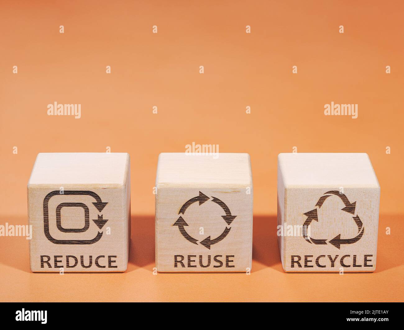 REDUCE, REUSE and RECYCLE symbols as a resource consumption management concept Stock Photo