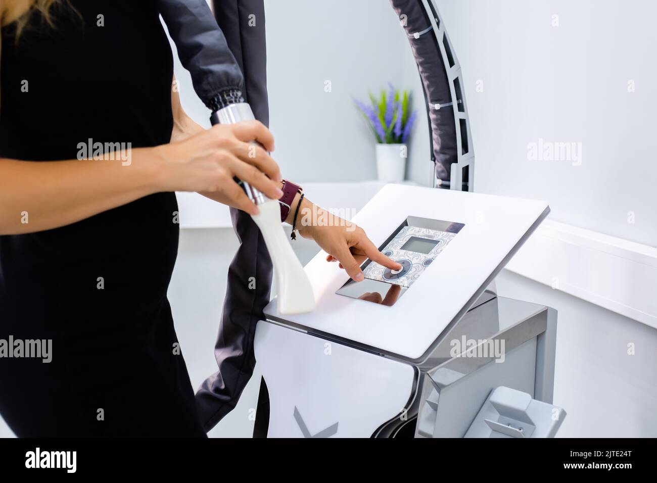 Woman Holds Manipulator Of Apparatus Anticellulite LPG Massage
