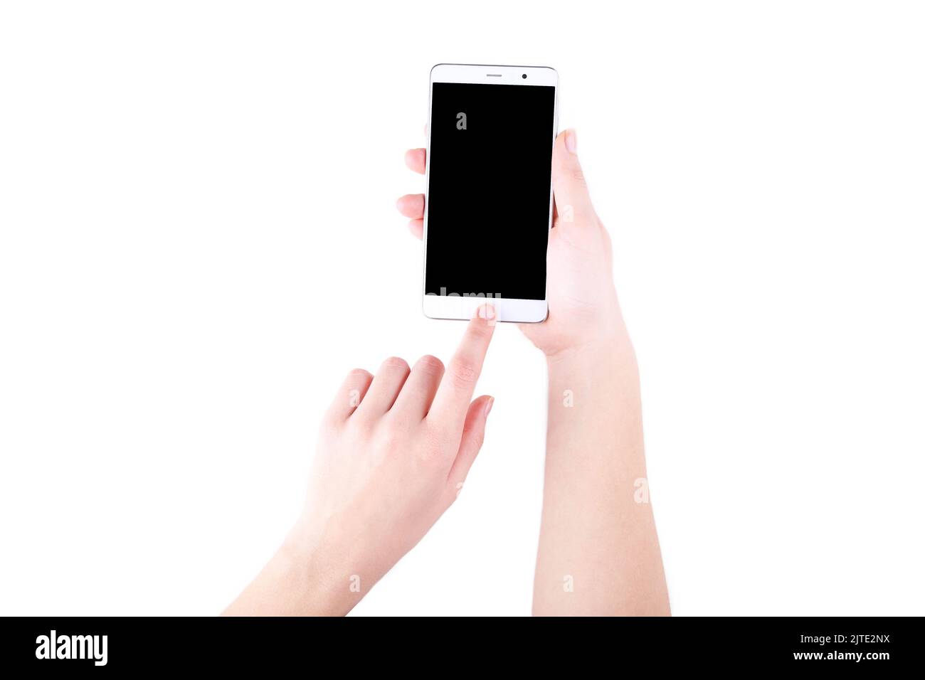 Female hands holding mobile phone with blank screen isolated on white ...