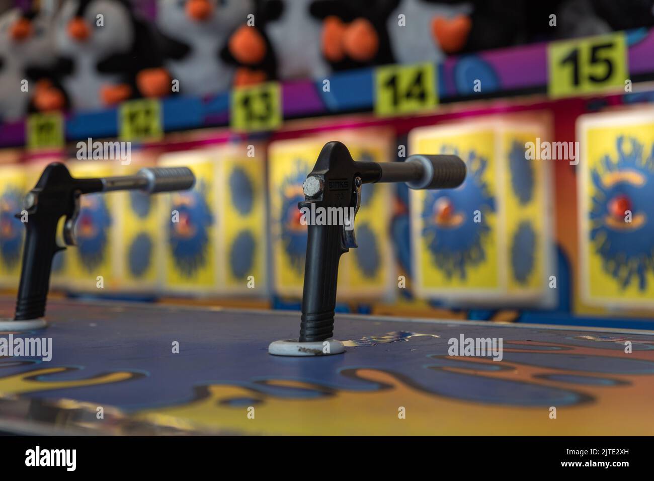 A closeup of a water gun game at a country fair Stock Photo Alamy