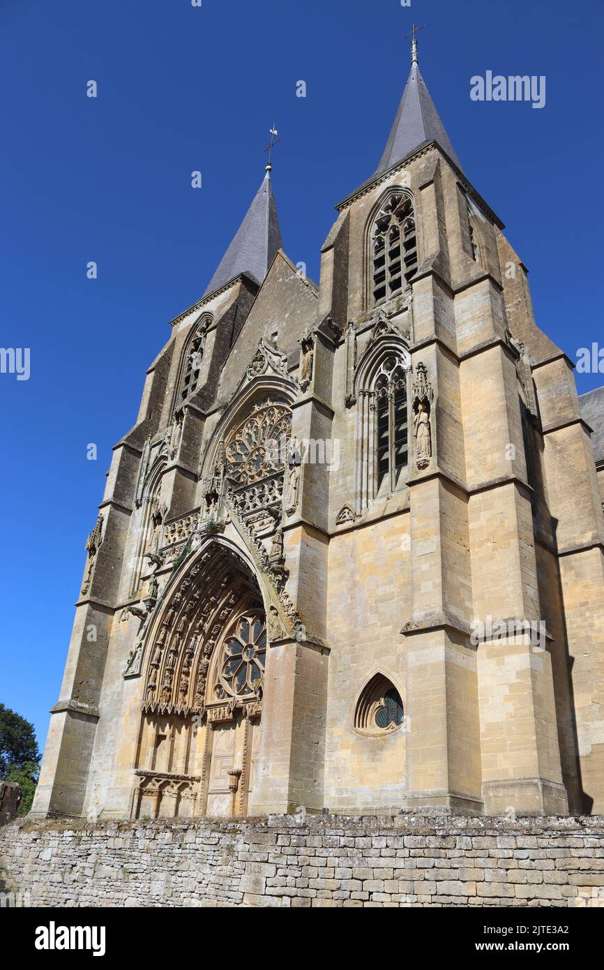Exterior view of the beautiful gothic style Basilica of Notre Dame of Avioth. Located in the region of Grand Est France, summer view with clear sky. Stock Photo