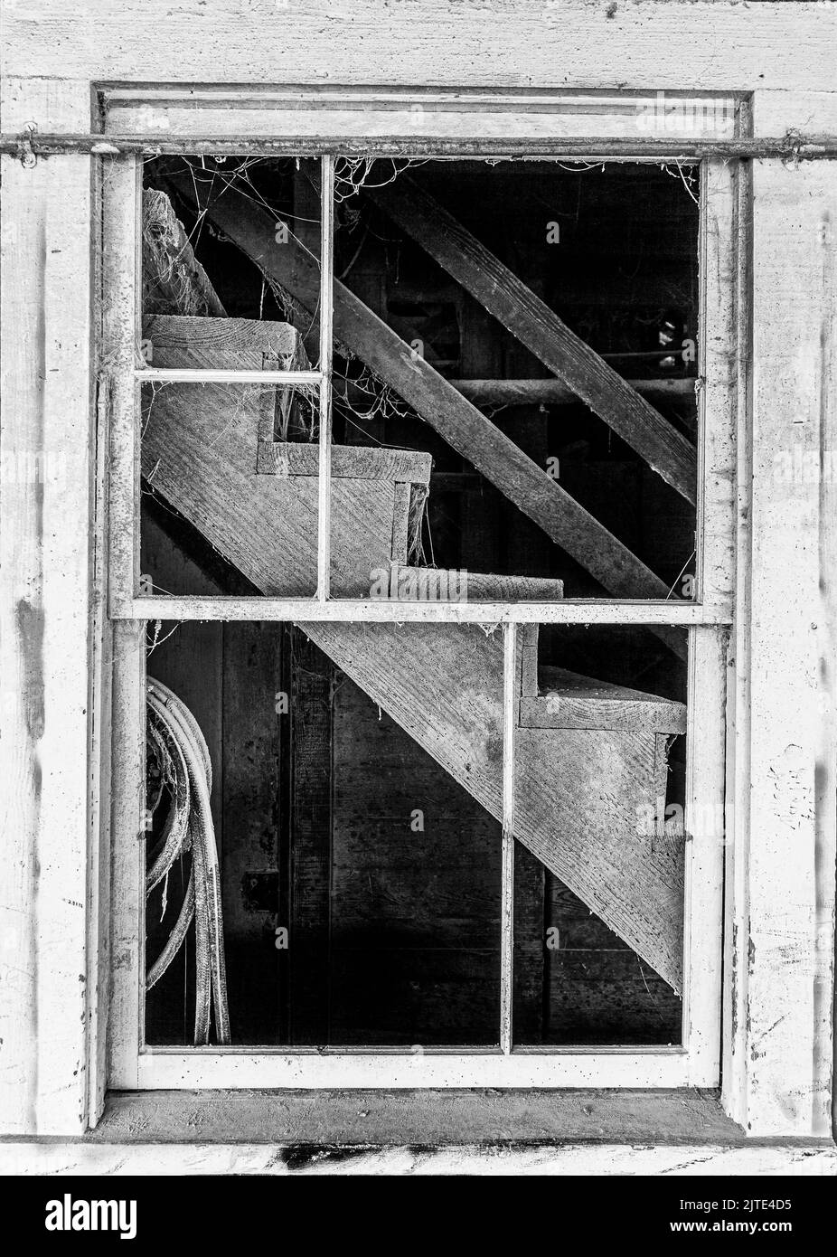 A grayscale window view of stairs Stock Photo Alamy