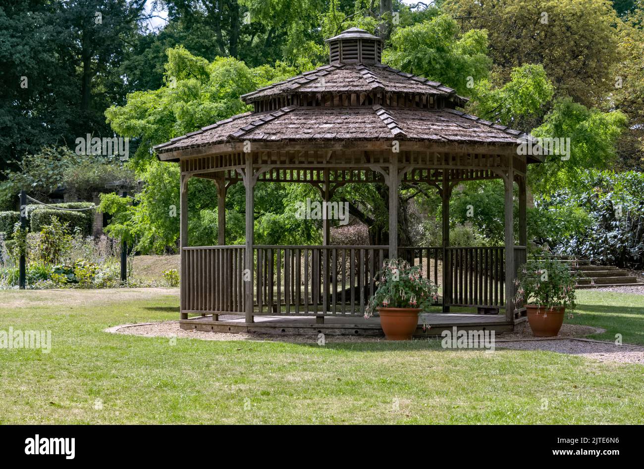 Wooden Gazebo with slate roof in the gardens of Knebworth House UK Stock Photo