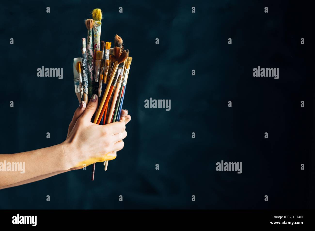 art supplies tools talent paintbrushes hands Stock Photo Alamy