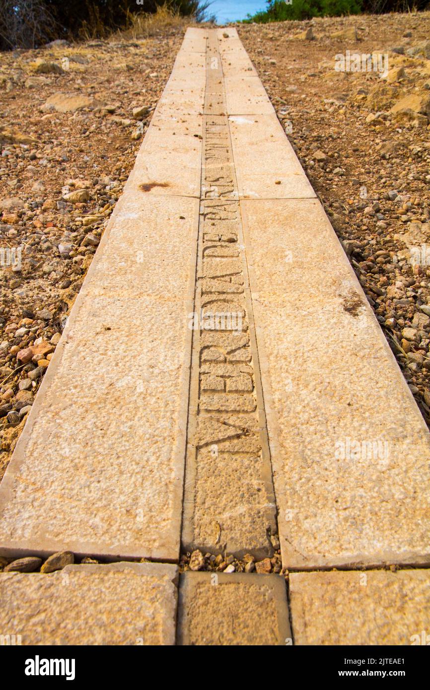 Meridian.sign line on groundfloar 2º 20' 14'' E in Sa Dragonera island, Mallorca Spain Natural park reserve Mediterranean Stock Photo