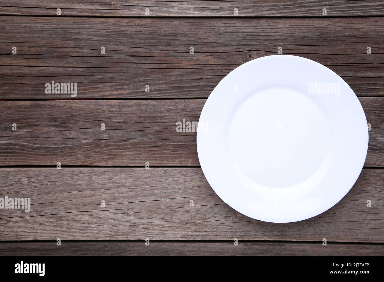 White empty plate on grey background, close up Stock Photo