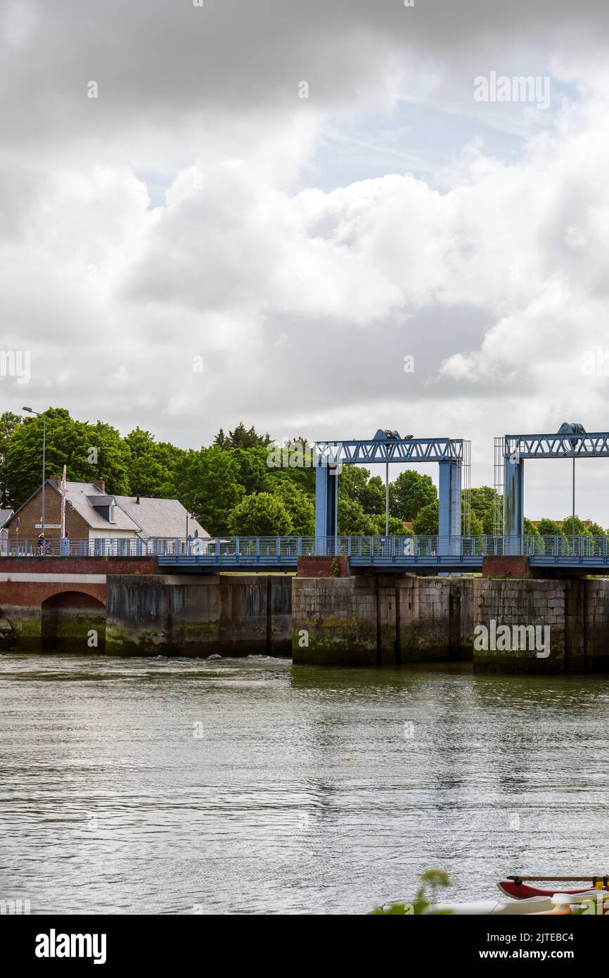 SAINT-VALERY-SUR-SOMME, FRANCE - MAY 26th, 2022: Lock on the Somme canal on a cloudy spring afternoon, Hauts-de France Stock Photo