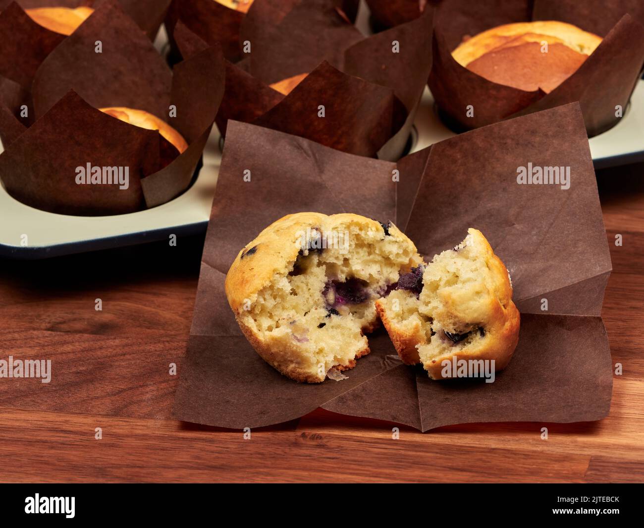 Ricotta and blueberry muffins in a gray muffin tray Stock Photo - Alamy