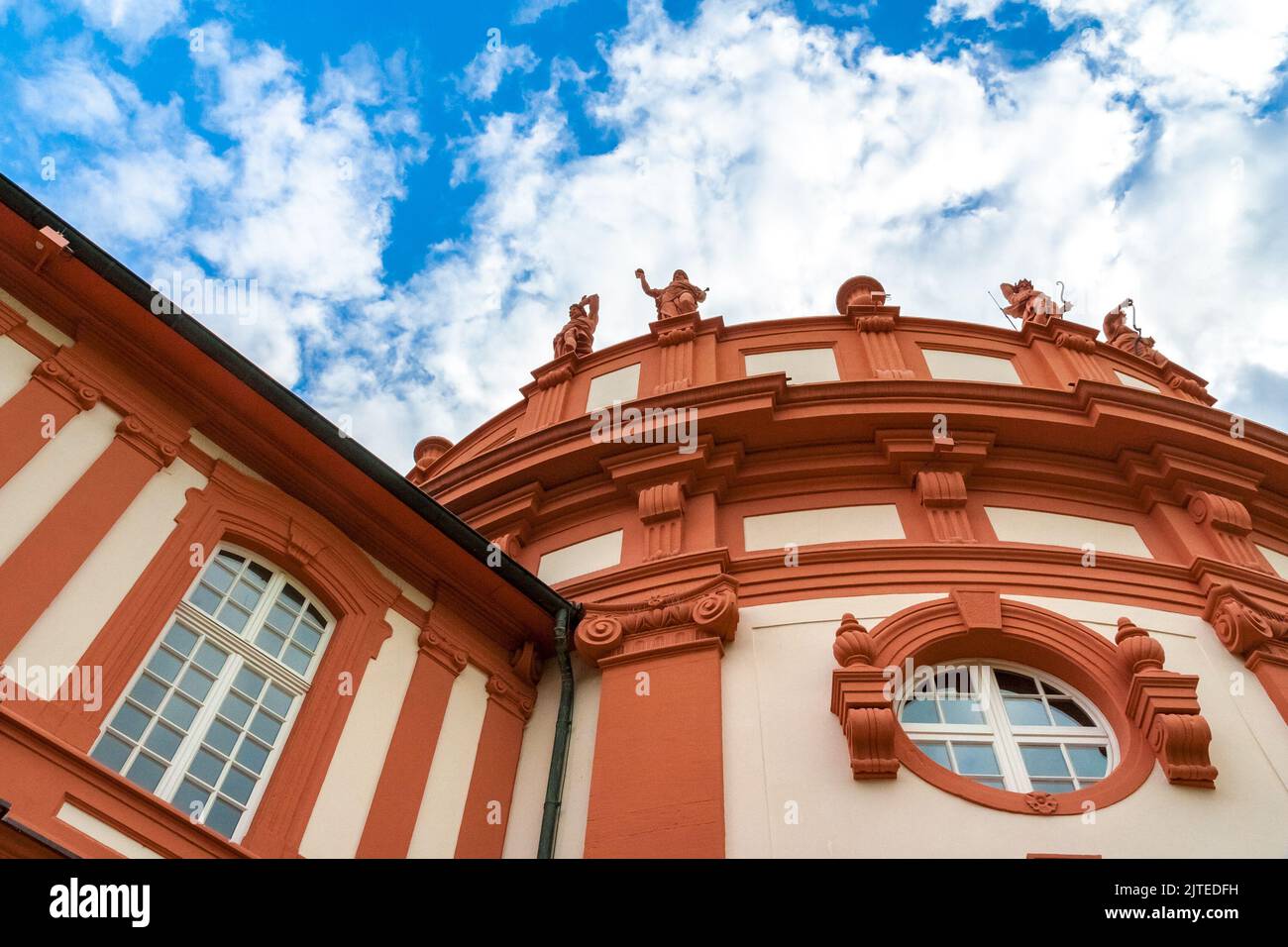 Nice low angle view of the rotunda of the famous Biebrich Palace in Wiesbaden, Germany. Crowned by statues of the gods of the ancient world, the... Stock Photo