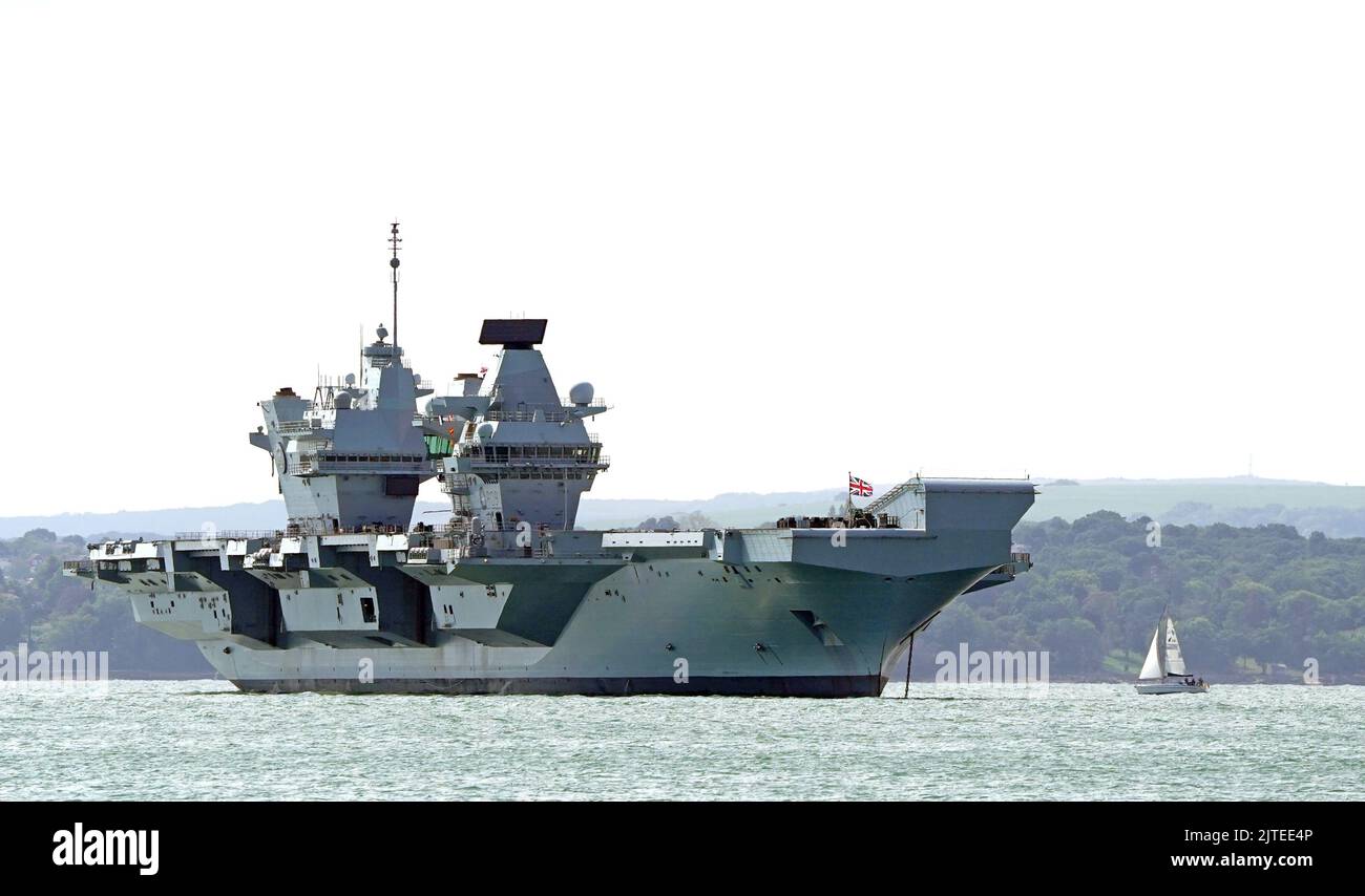 Aircraft carrier HMS Prince of Wales sits off the coast of Gosport