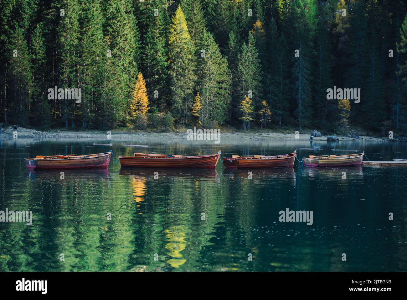 Boats on the Braies Lake ( Pragser Wildsee ) in Dolomites mountains, Sudtirol, Italy Stock Photo