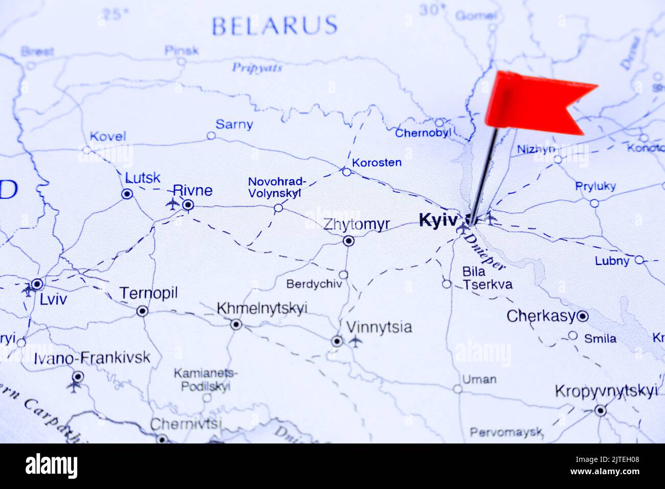 Red pointing flags on Kyiv city on white map Stock Photo