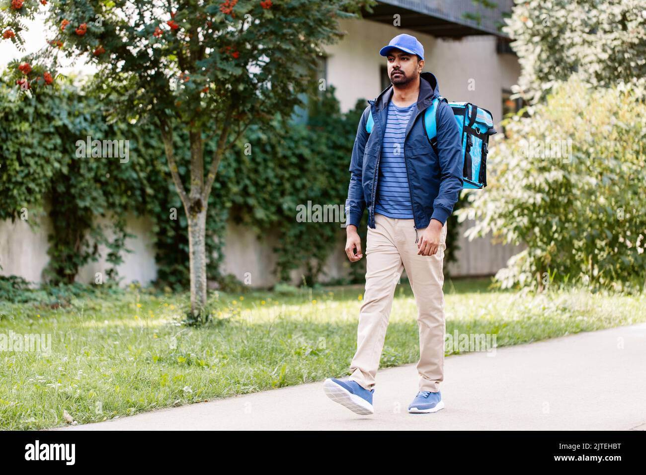 Indian people walking with bag hi-res stock photography and images - Alamy