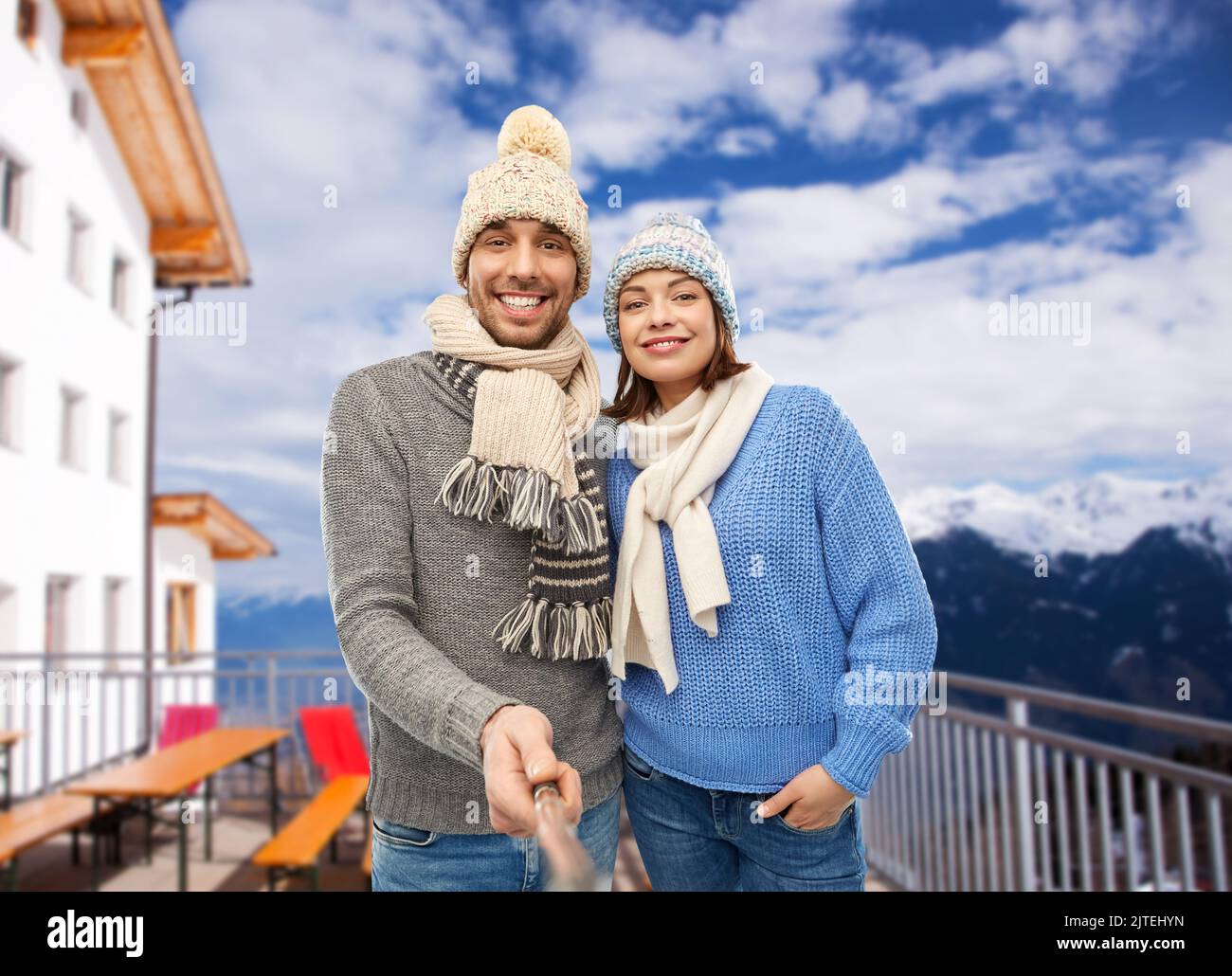 happy couple taking selfie in winter Stock Photo