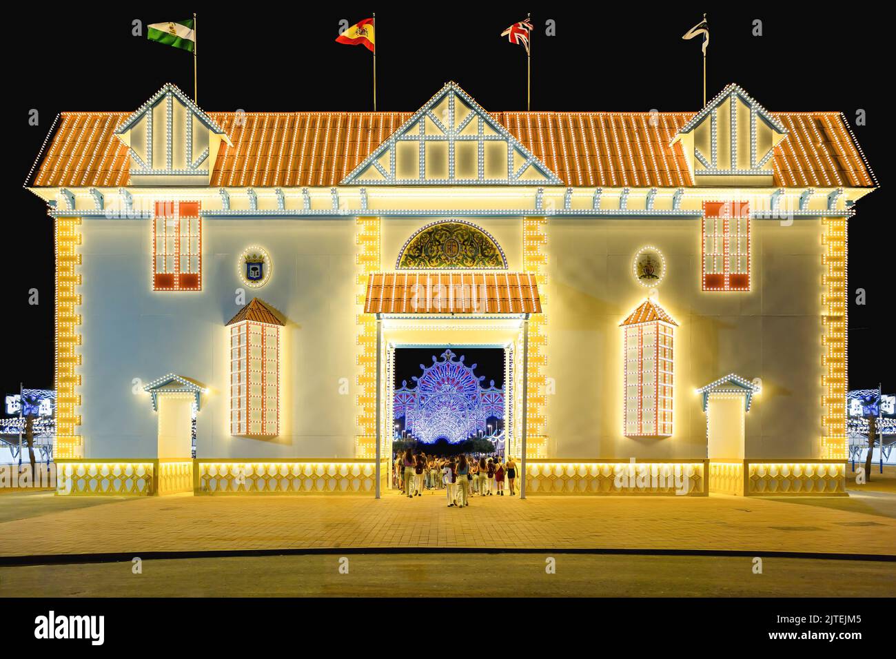Illuminated doorway for the 2022 Colombine festivities, which recreates one of the 274 homes in the Reina Victoria neighborhood, also known as Barrio Stock Photo
