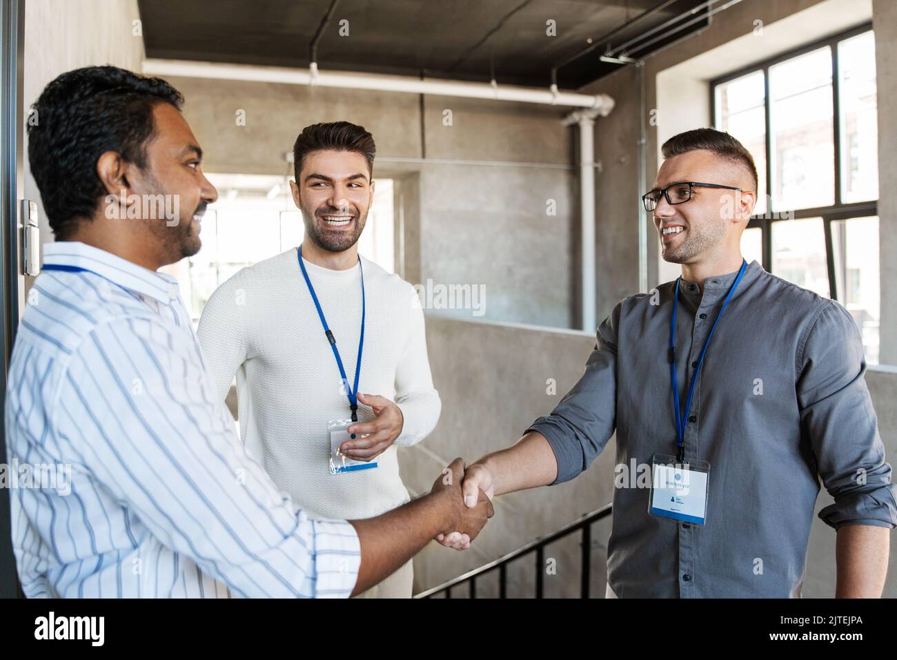 happy businessmen making handshake at office Stock Photo