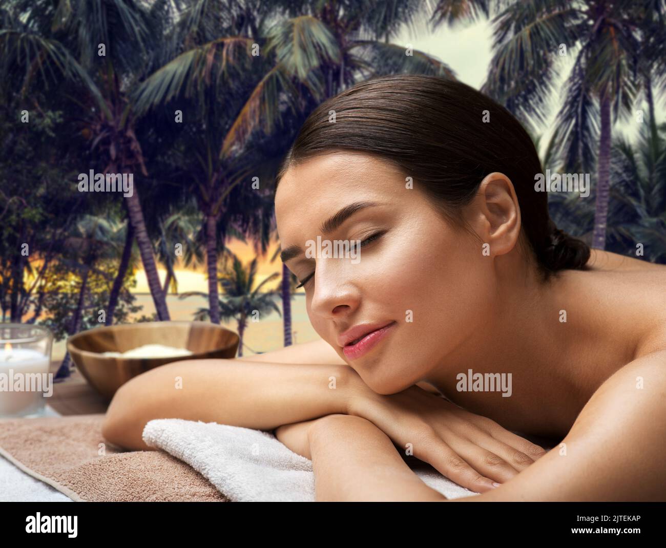 young woman lying at spa or massage parlor Stock Photo