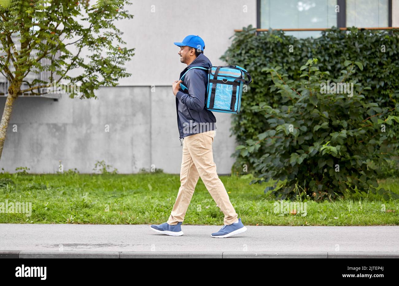Indian man walking side view hi-res stock photography and images - Alamy