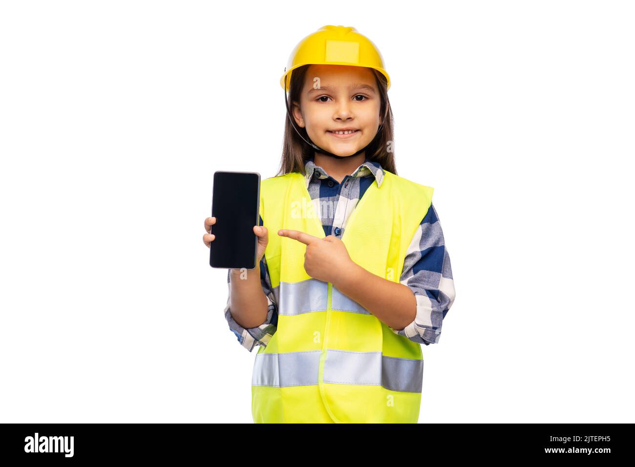 little girl in construction helmet with smartphone Stock Photo Alamy