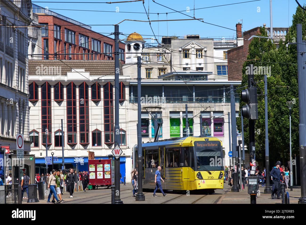 Manchester Mossley Street with a Metrolink tram Stock Photo Alamy