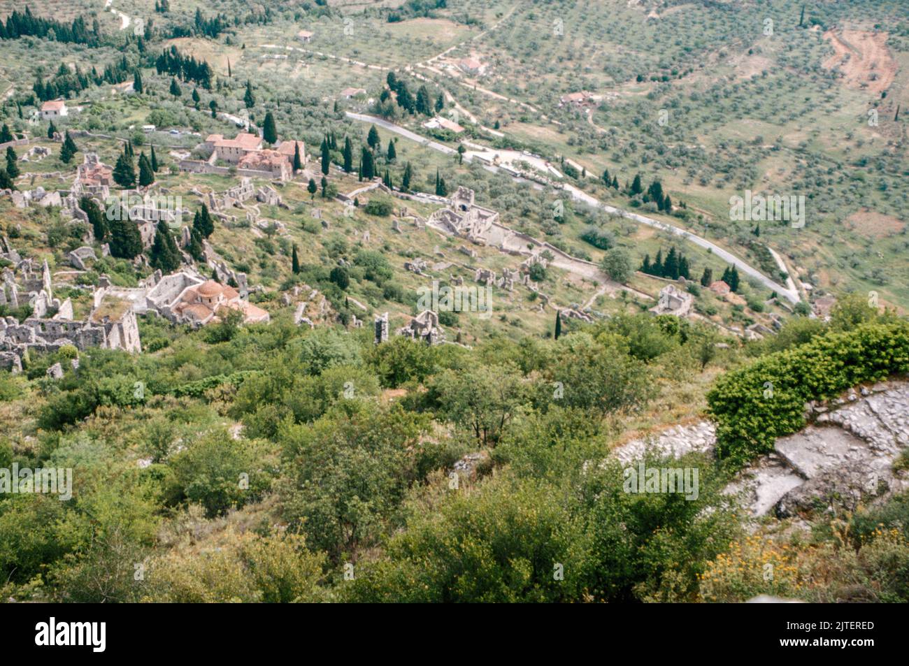View form the Mystros hill on Mystras (Mistras or Myzithras), a fortified town and a former municipality in Laconia, Peloponnese, Greece near ancient Sparta, it served as the capital of the Byzantine Despotate of the Morea. March 1980. Archival scan from a slide. Stock Photo