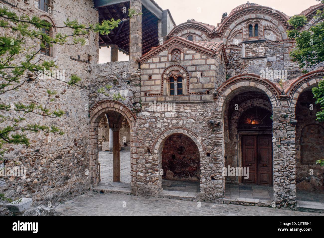 Metropolis of Saint Demetrios at Mystras (Mistras or Myzithras), a fortified town and a former municipality in Laconia, Peloponnese, Greece near ancient Sparta, it served as the capital of the Byzantine Despotate of the Morea. March 1980. Archival scan from a slide. Stock Photo