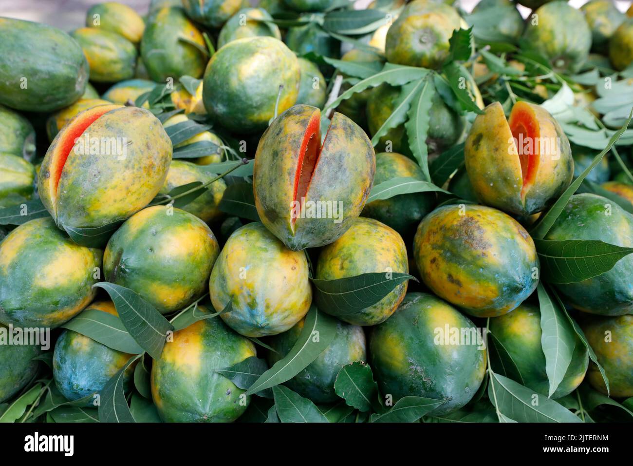 Dhaka, Bangladesh August 30, 2022 A vendor is selling ripe papaya at