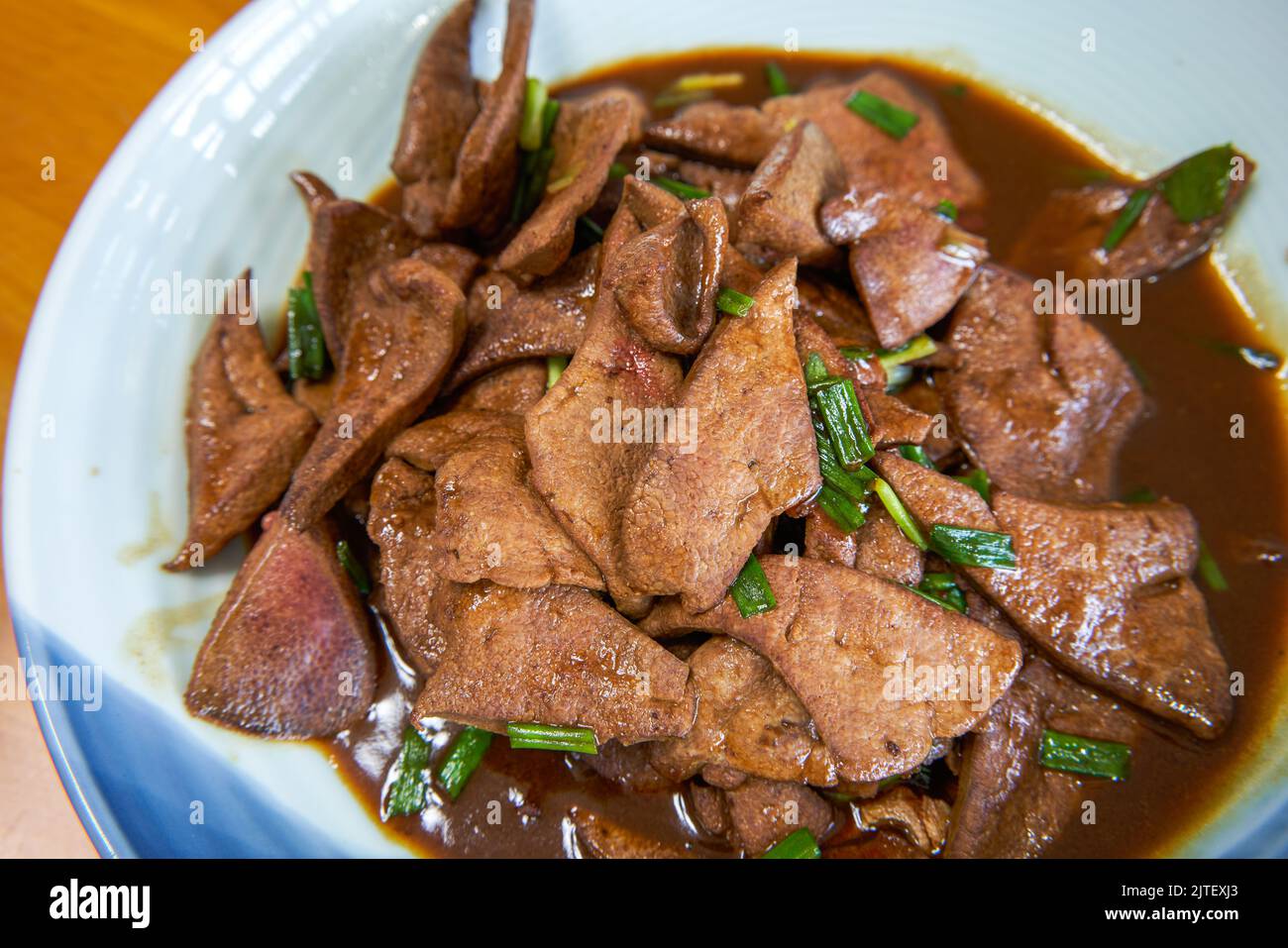 A plate of delicious Chinese homecooked dishes, fried pork liver with