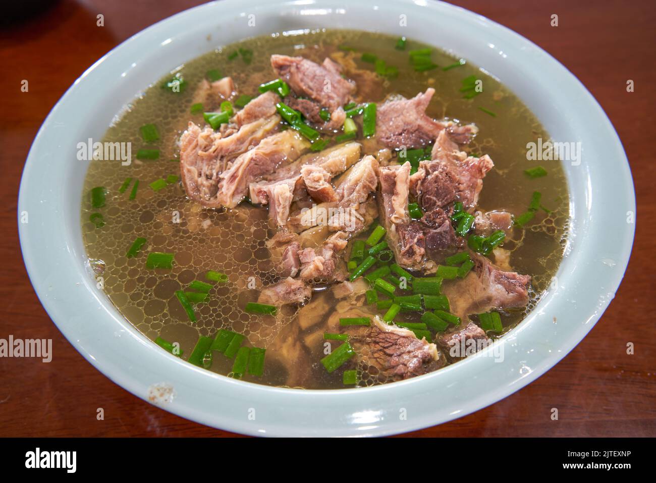 A bowl of delicious and fragrant Cantonesestyle clear soup beef