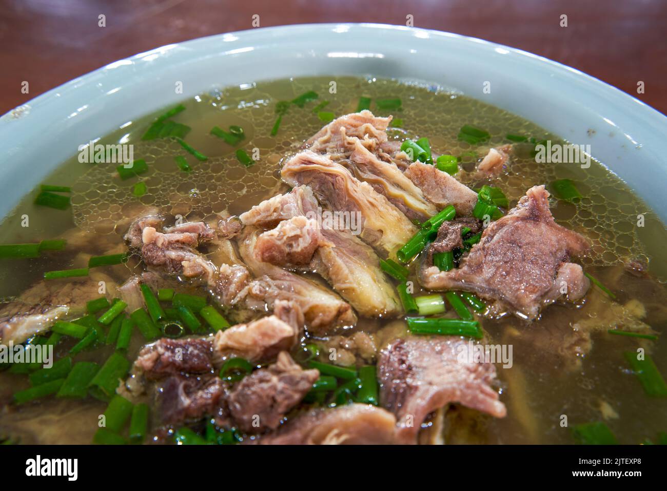 A bowl of delicious and fragrant Cantonesestyle clear soup beef